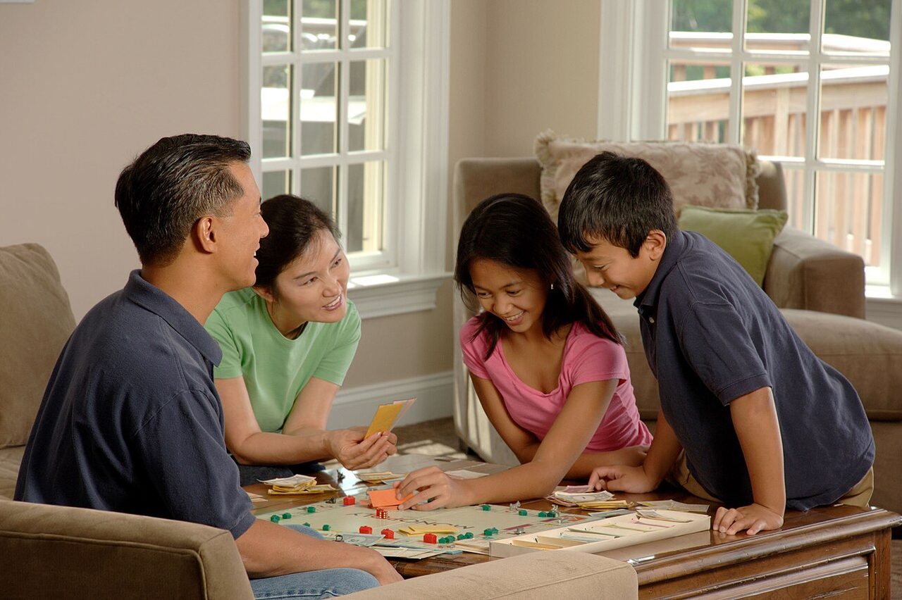 A family playing a board game together
